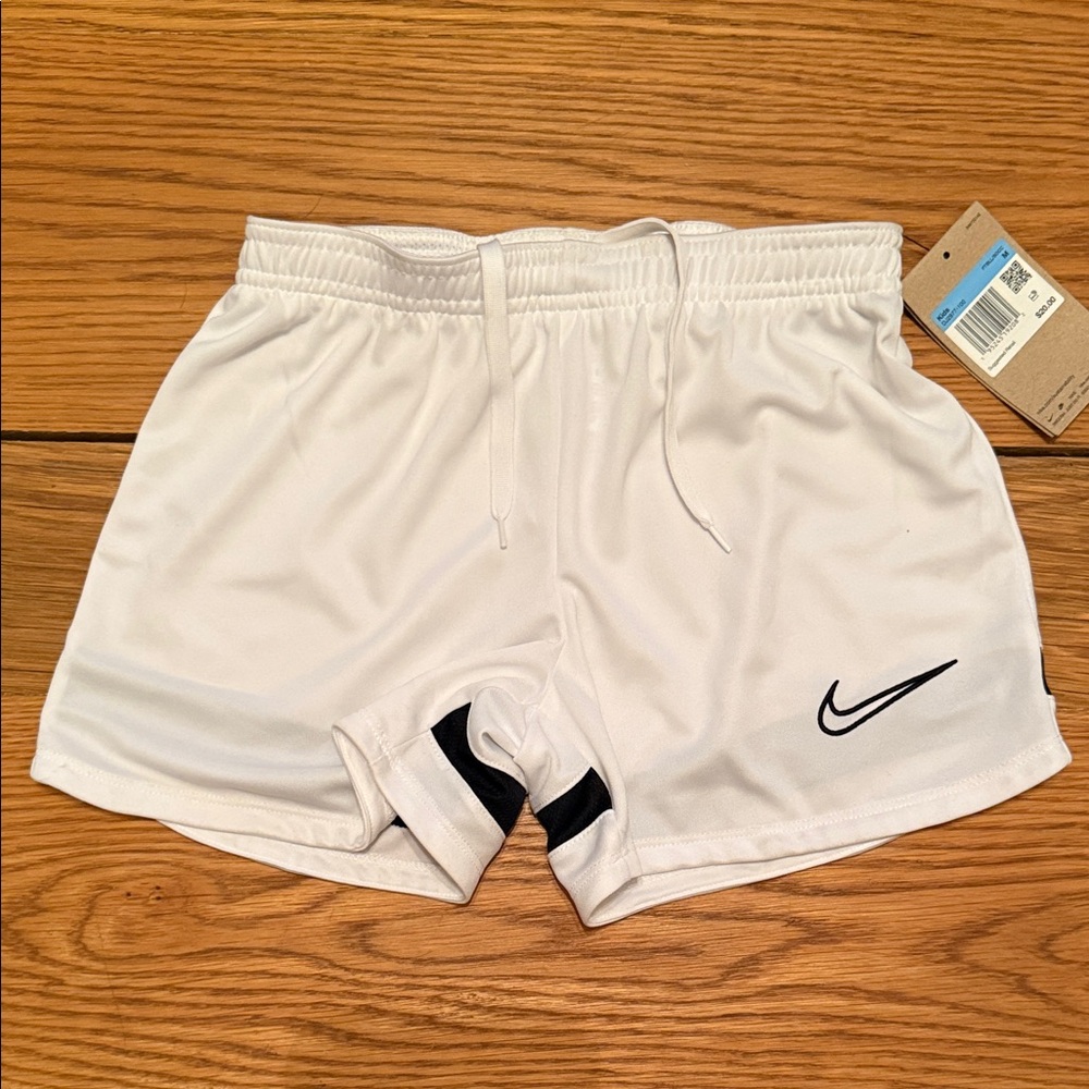 Nike White Sports Shorts with Black Logo - youth M